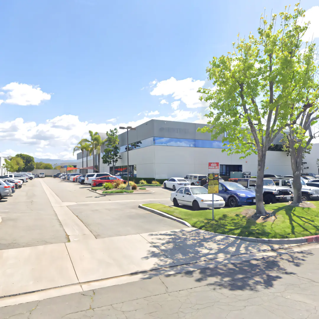 A full color 1080x1080 webp image of CAT Exteriors' main office in Anaheim, California.
