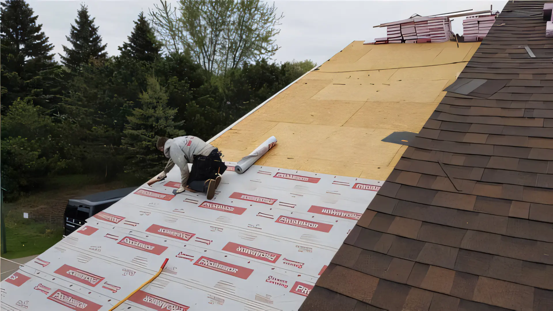 A full color 1920x1080 webp image of a close-up view of Malarkey roofing shingles installed by CAT Exteriors.