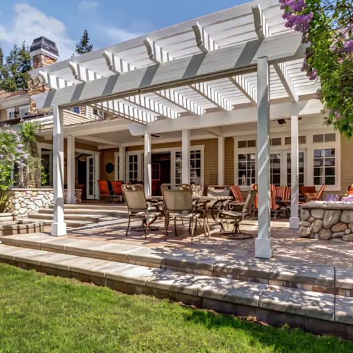 A full color 512x512 webp image of a newly installed patio cover by CAT Exteriors.