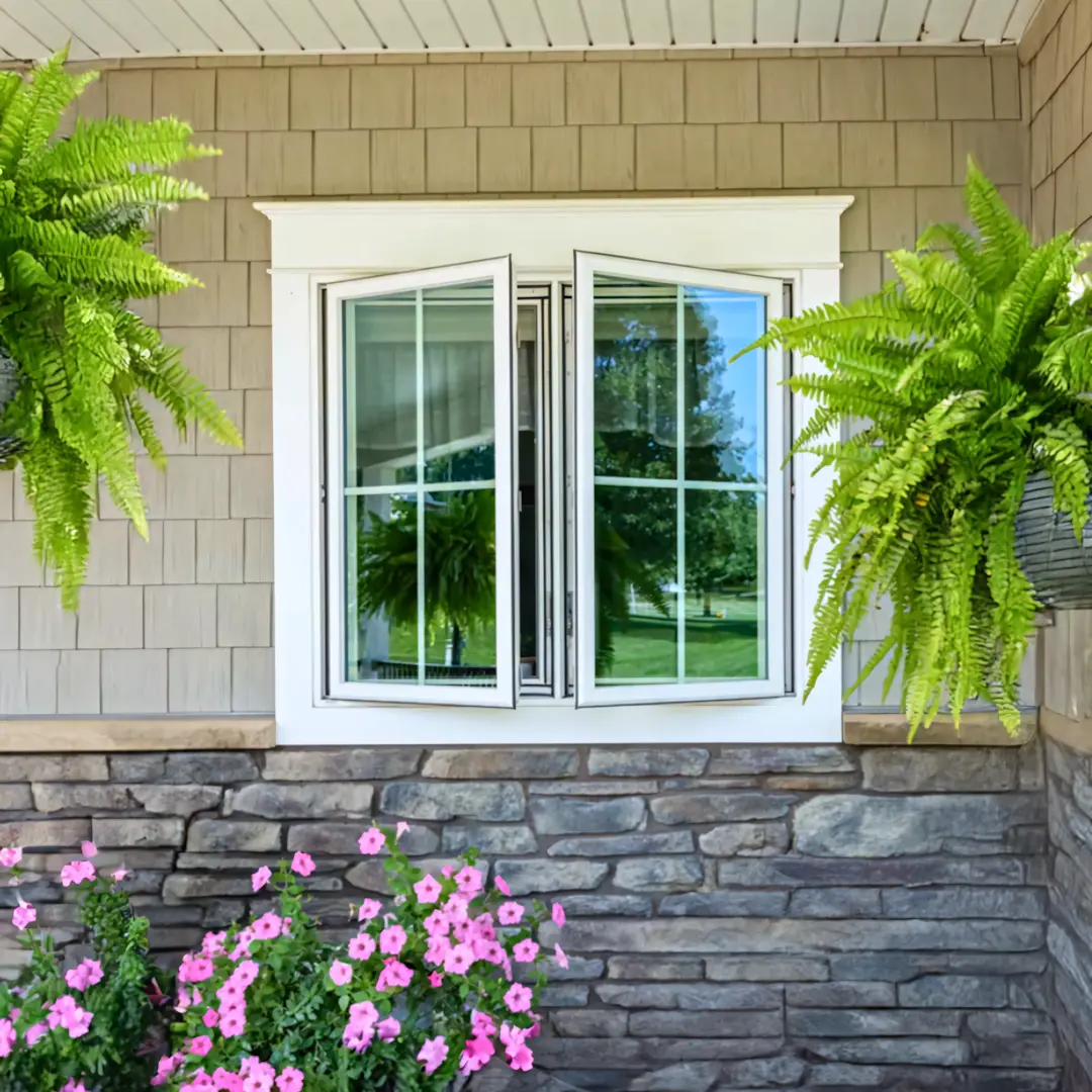 A full color 1080x1080 webp image of casement windows installed by CAT Exteriors.