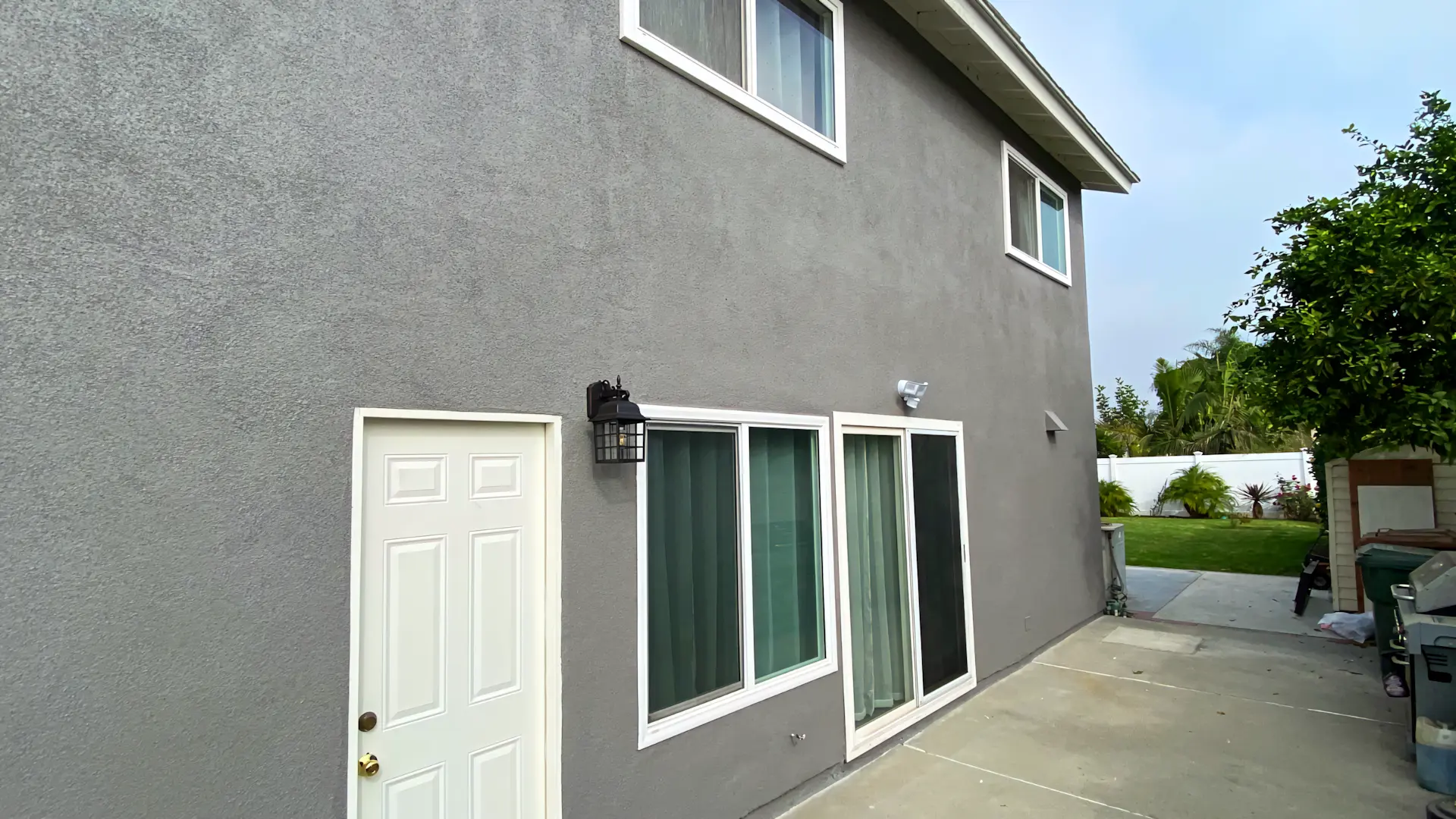 A full color 1920x1080 webp image of a completed exterior coating shown on a CAT Exteriors project.