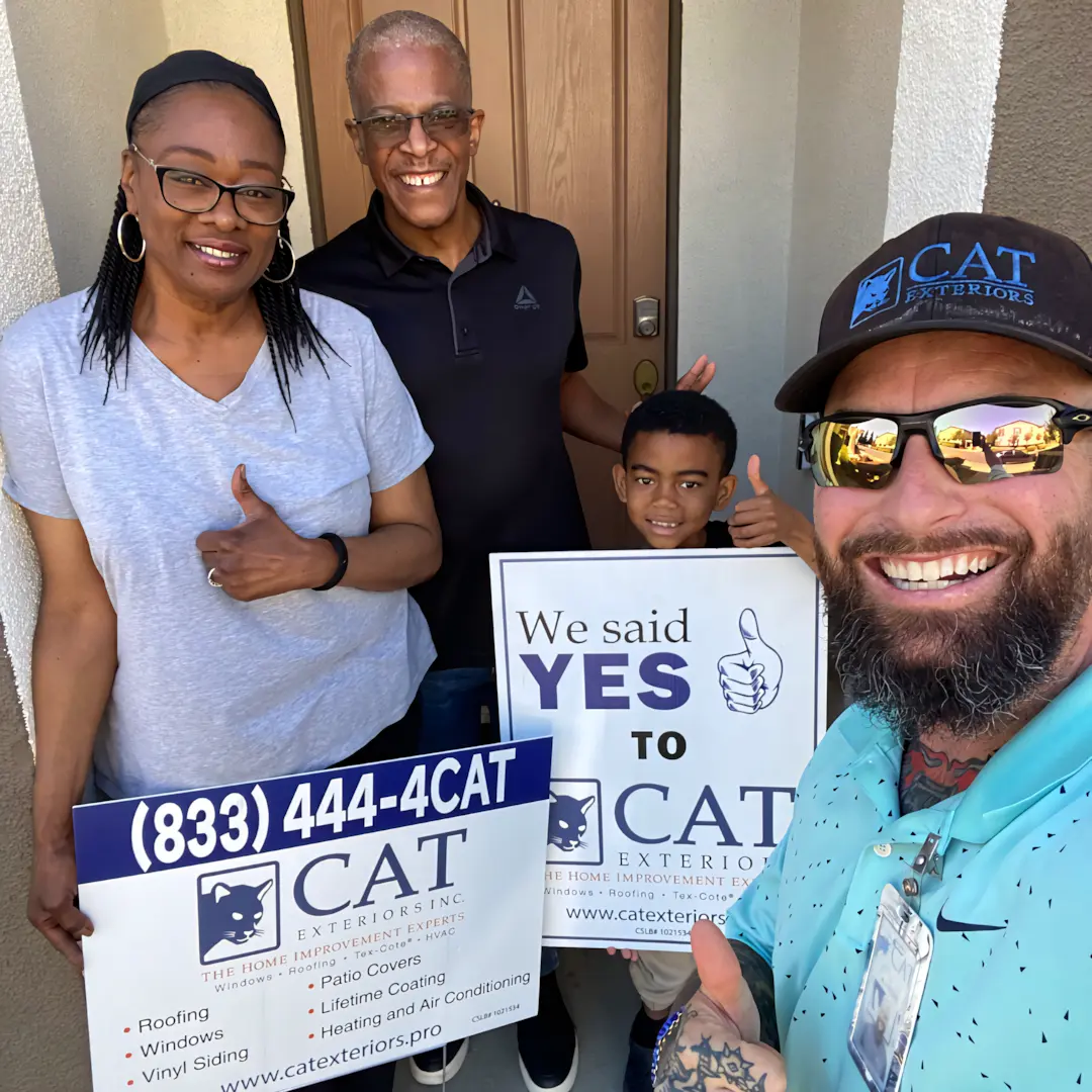 A full color 1080x1080 webp image of a CAT Exteriors representative taking a photo with a happy client at their home.