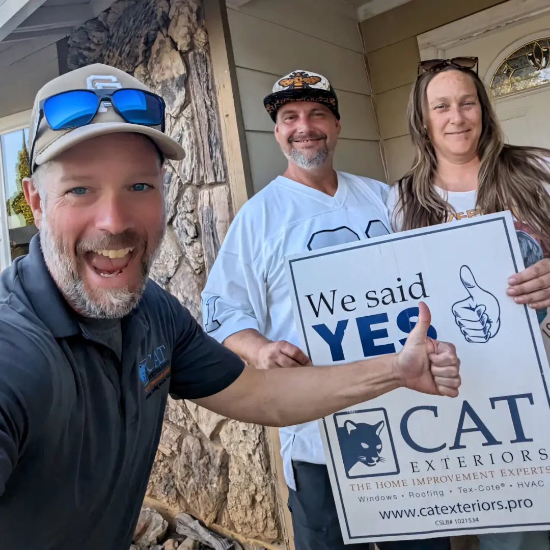 A webp image of a CAT Exteriors representative with a client used in the gallery section on the consultation page at www.catexteriors.pro, a home renovation contractor in California, Arizona, and Texas.
