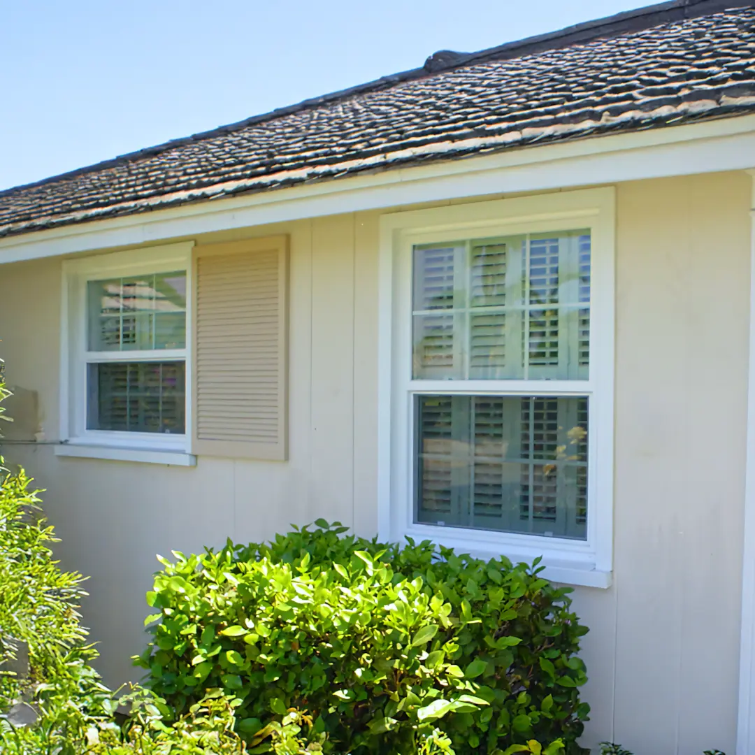 A full color 1080x1080 webp image of double hung windows installed by CAT Exteriors.