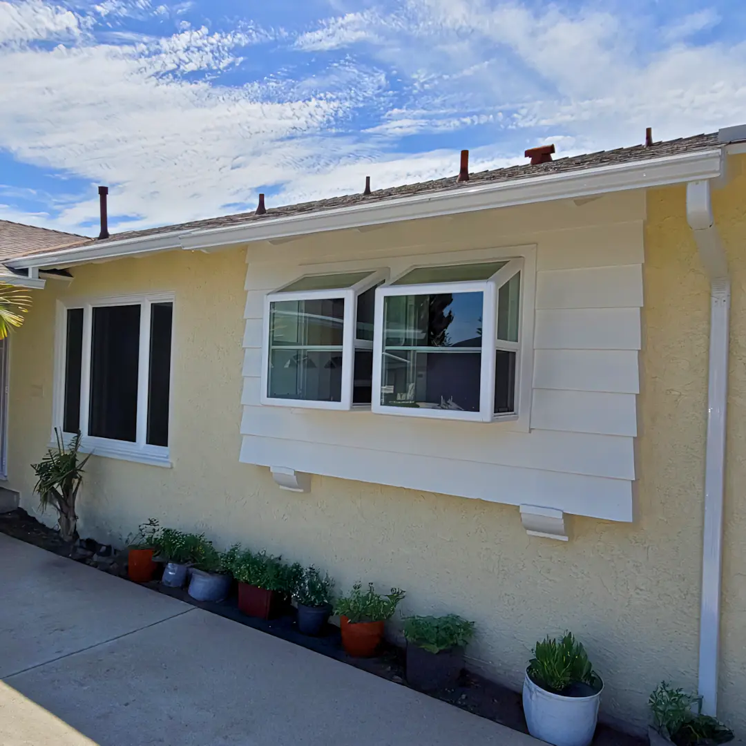A full color 1080x1080 webp image of garden windows installed by CAT Exteriors.