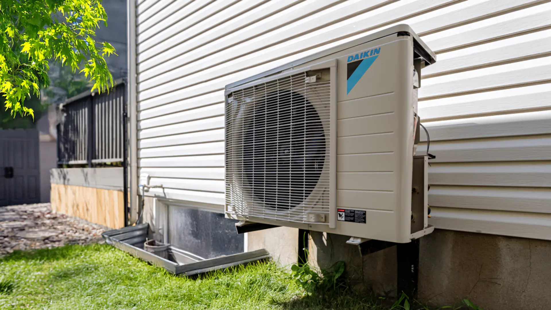 A full color 1920x1080 webp image of CAT Exteriors installed HVAC unit on a residential property.