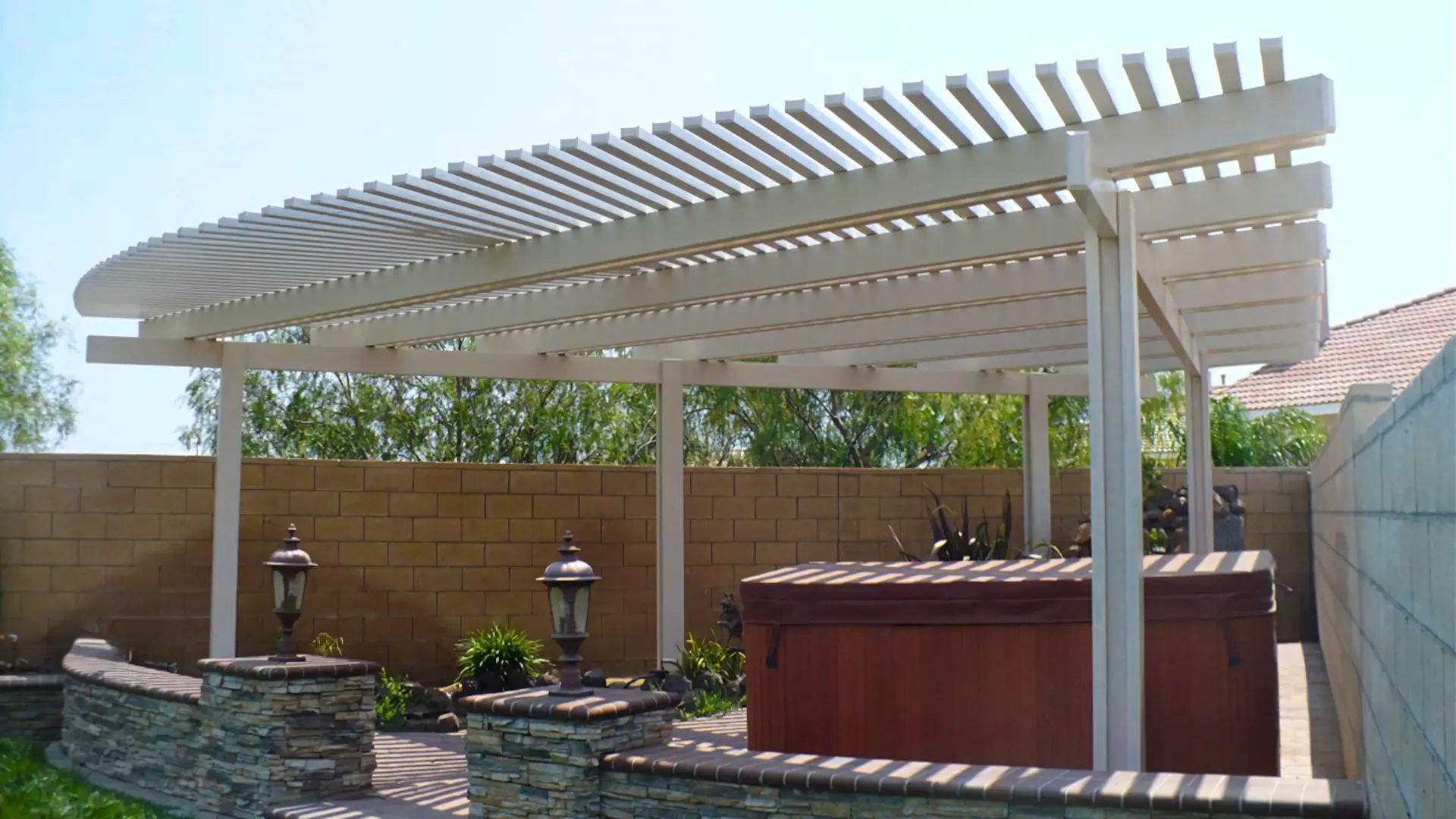A full color 1920x1080 webp image of a highlighted patio cover installation by CAT Exteriors.