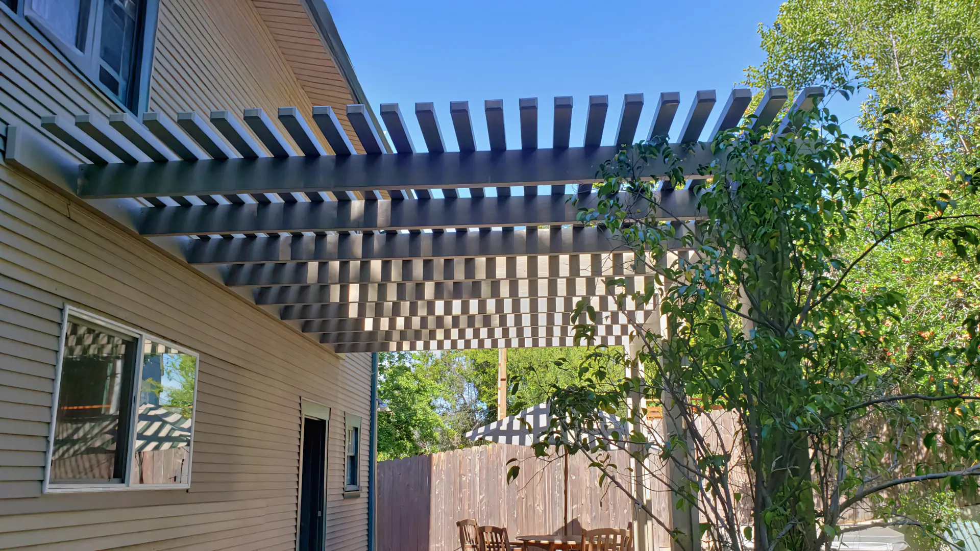 A full color 1920x1080 webp image of a second highlighted patio cover project by CAT Exteriors.