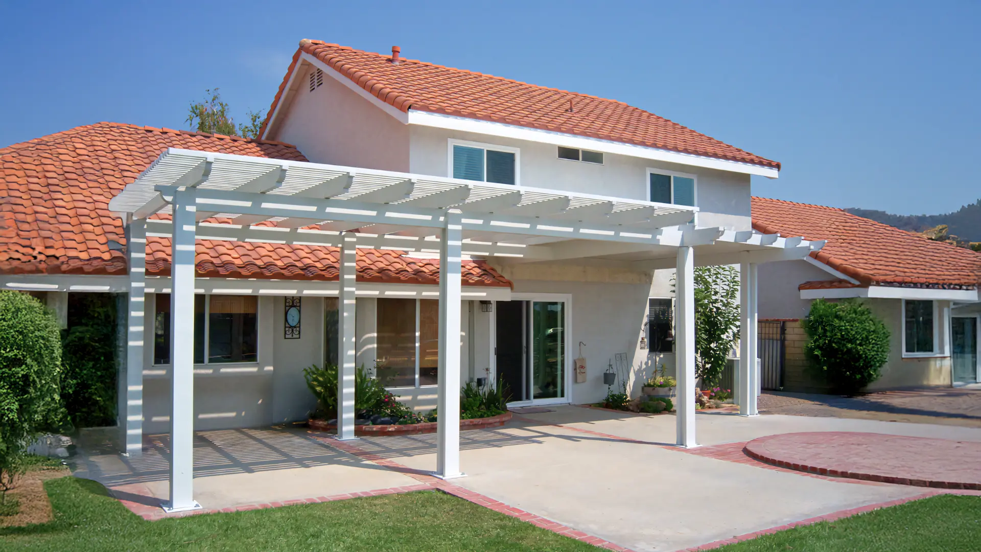 A full color 1920x1080 webp image of a completed patio cover project by CAT Exteriors.