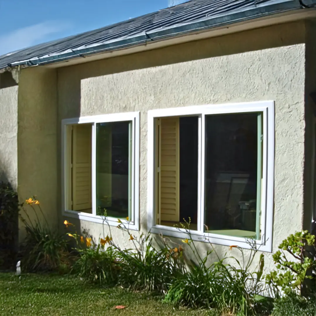 A full color 1080x1080 webp image of slider windows installed by CAT Exteriors.