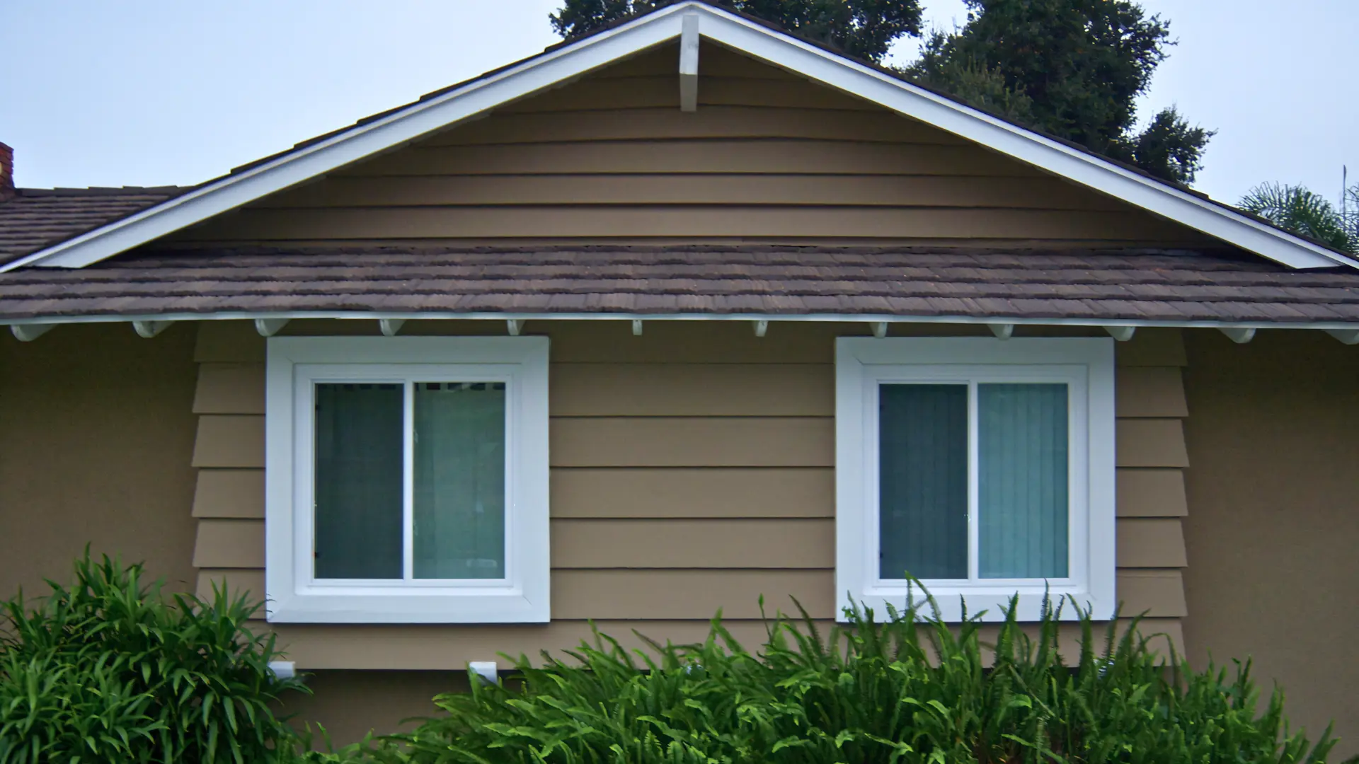 A full color 1920x1080 webp image of a modern window installation by CAT Exteriors.