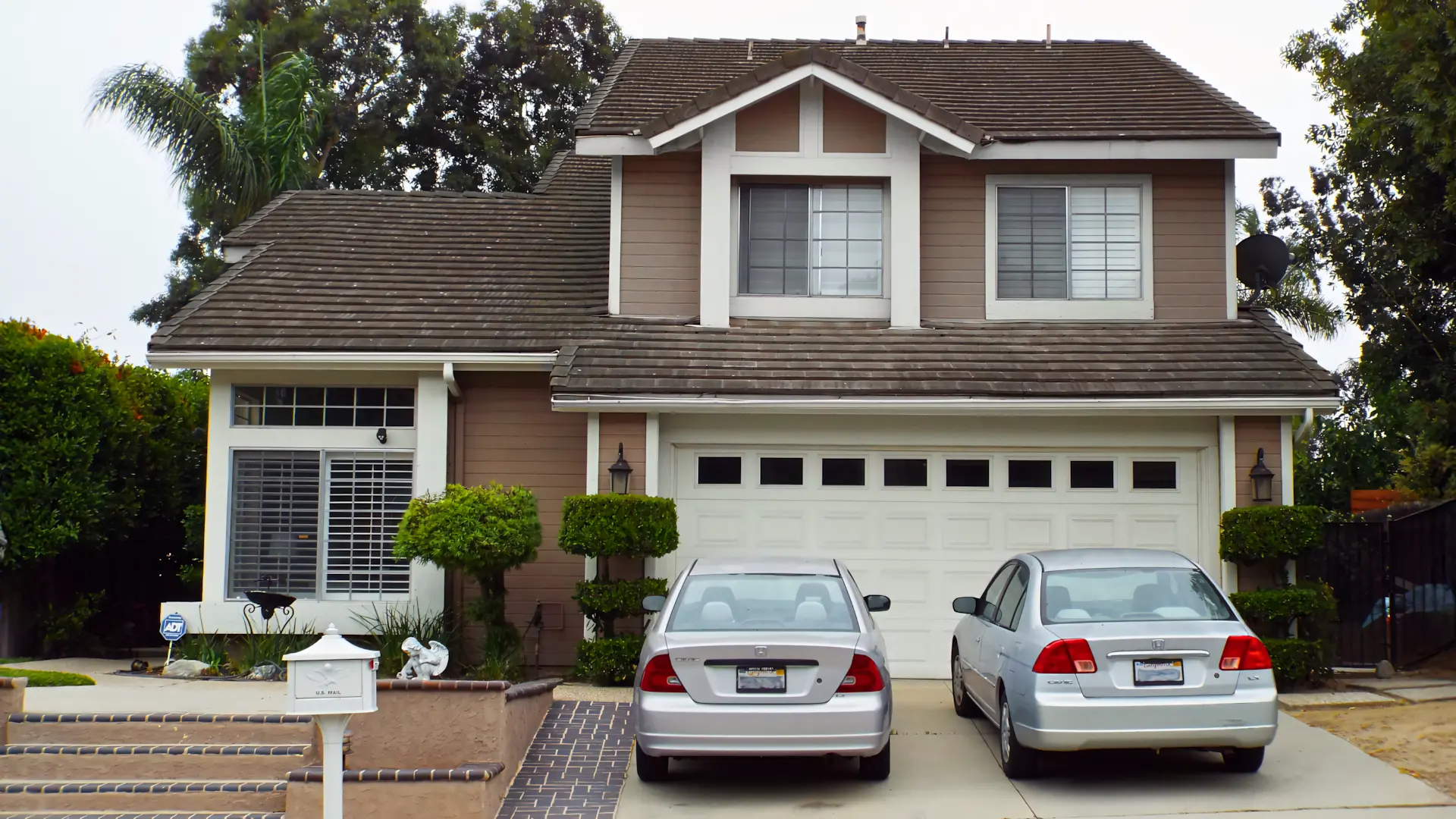 A full color 1920x1080 webp image of a residential window installation by CAT Exteriors.
