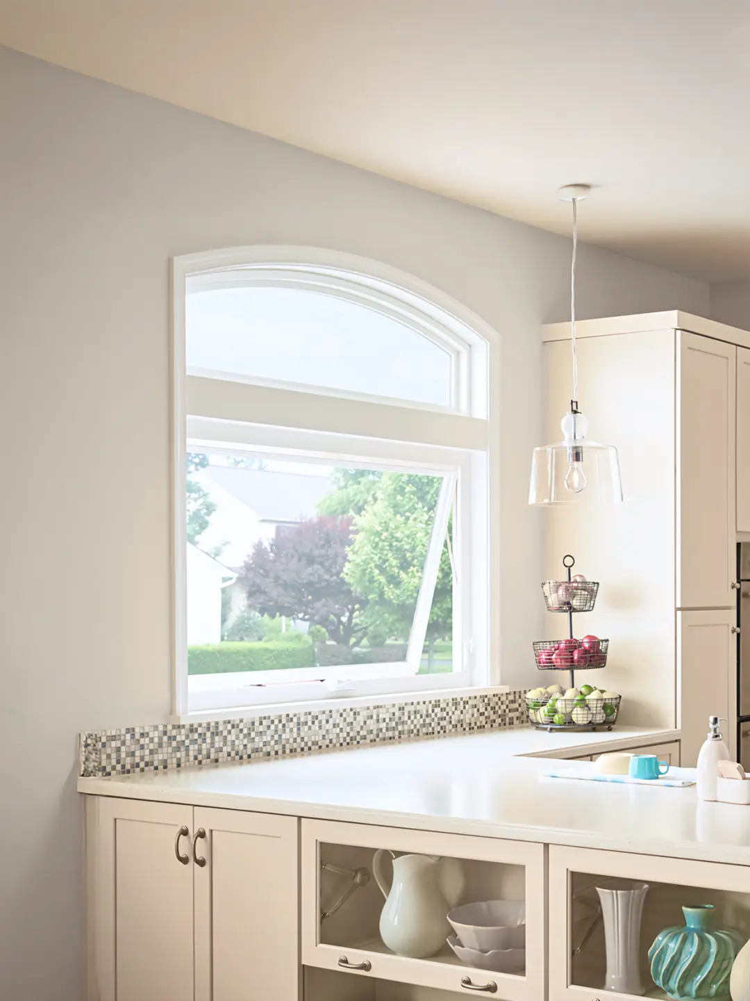 A full color 1080x1440 webp image of a completed awning window installation by CAT Exteriors.