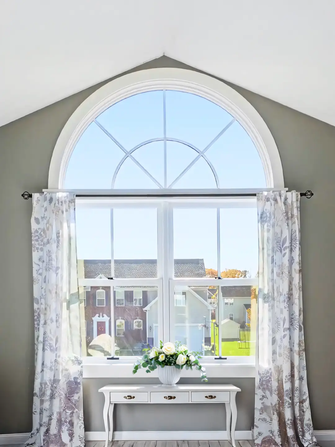 A full color 1080x1440 webp image of a completed geometric window installation by CAT Exteriors.