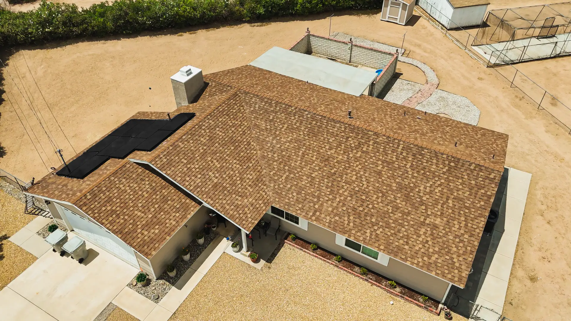 A 1920x1080 webp image of a home after applying shingle saver protective coating on the roof.